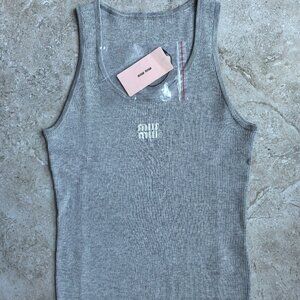 Miumiu's grey vest